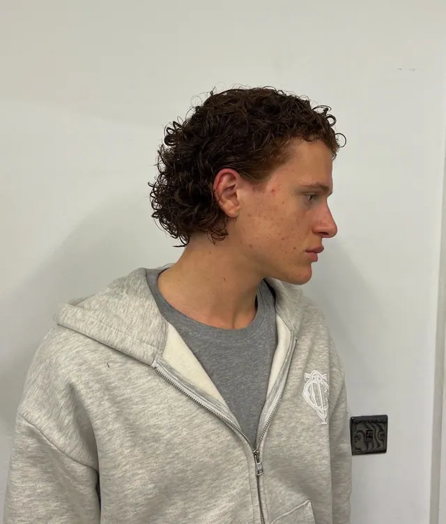 A curly mullet
